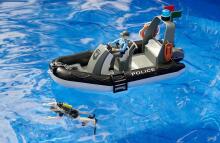 BRUDER RAM 2500 Policeman Dodge Ram with figure +trailer+boat