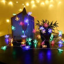 Ikonka Art.KX5240_2 LED sniegpārsliņu ķēdes apgaismojums 10m 100LED daudzkrāsains