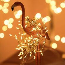 Ikonka Art.KX5238 LED gaismas vītņu virtene virtene čiekuru 6m 200LED silti balta