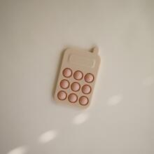 Mushie Phone Press Toy Art.2860019 Augstākas kvalitātes - silikona grabulis motorikai (100% dabisks)