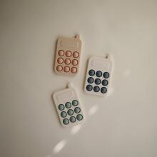 Mushie Phone Press Toy Art.2860031 Augstākas kvalitātes - silikona grabulis motorikai (100% dabisks)