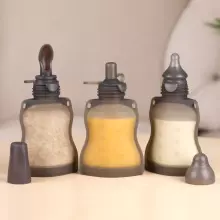 Haakaa Silicone Pouch with Feeding Spoon Art.MHK154 vairākkārt lietojams saspiežamais konteineris ar karoti ,130ml