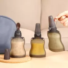 Haakaa Silicone Pouch with Feeding Spoon Art.MHK154 vairākkārt lietojams saspiežamais konteineris ar karoti ,130ml